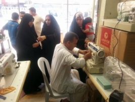 Advice Centre in Najaf, distributes 4 sewing machines as part of the charity bank program supporting small businesses 04/06/2014