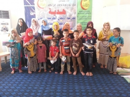 مركز ارشاد النجف يوزع ملابس واحذية لـ 80 يتيما بمناسبة حلول عيد الفطر المبارك هدية من مدرسة الايمان العربية في لندن