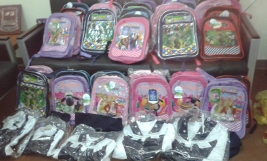 Sadr City - Distributes school uniforms and school bags to 40 children.