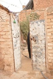 A widow with three children appeals for help to provide better living conditions for her family