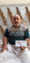 فرع مدينة الصدر: السيد ابراهيم كاظم يحصل على تبرع مادي من السيد سايمون ديلي