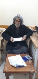 فرع مدينة الصدر: السيد / حسين هاشم عبد الرضا  يحصل على الكفالة الطبية الشهرية من المتبرع سايمون ديلي.
