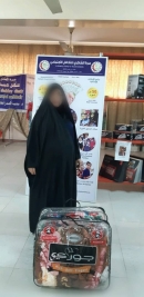 بغداد-فرع مدينة الصدر : الارملة اميرة تحصل على تبرع من المرحوم محمد القزاز.