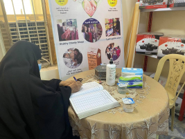 فرع البياع : تسليم الكفالة  الطبية للمسنة (حسنية . م) من الحاج / عز الدين الكواز