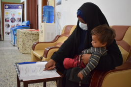 فرع النجف :-  تسليم الاعانة لاسره المتعفف ( مجيد . ع . د  ) من قبل الحاج / عبد الصاحب الشاكري 