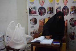 فرع النجف :- تسليم الاعانه لاسره المتعففه / علياء . ع . م من قبل الاستاذ / كامل الشريفي