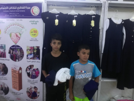 CHILDREN RECEIVE SCHOOL CLOTHES IN RESPONSE TO AN APPEAL