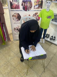 فرع البياع : مساعدة مالية من المتبرع / ليث كبة , للارملة المسنة (بلقيس ,ن)