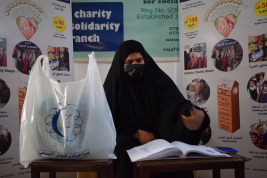 فرع النجف :- تسليم الاعانه المستلمه  من قبل الاستاذ / ك . ا 