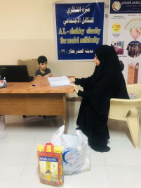 فرع مدينة الصدر : تسليم كفالة الايتام الشهرية من  السيدة / سهى شبر