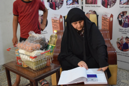 فرع النجف :-  تسليم الاعانه الوارد من قبل السيده / فيروز الواسطي