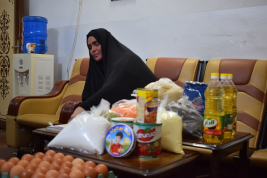 فرع النجف :- تسليم المساعده لاسره السيده / زينب . ف . ر من قبل السيد / ع . أ 