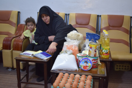 فرع النجف :- تسليم الاعانه المستلمه من قبل السيده / سهى شبر