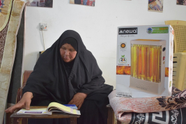 فرع النجف :-  تسليم التبرع الوارده لارمله / فريه . ح . ك من قبل السيدتين / ولاء مجيد ووالدتها 