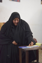 فرع النجف :-  تسليم الاعانه لاسره السيدة / امل . م . ح من قبل السيد / ليث كبه 