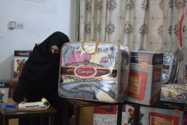 فرع النجف :- تسليم الاعانه لاسره السيدة / امل . س . ع من قبل الاستاذ / ك . ا 