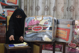 فرع النجف :- تسليم الاعانه لاسره المتعففه / شيماء . ك . س من قبل الحاج / عبد الصاحب الشاكري 