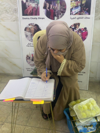 فرع البياع : تسليم مساعده مالية للارملة( نضال , ع ) من المتبرع ( ك ش)