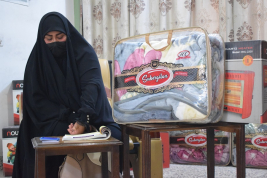 فرع النجف :-  تسليم التبرع الوارد لاسره السيده / نديمه . ح . ح من قبل السيد / ليث كبه 