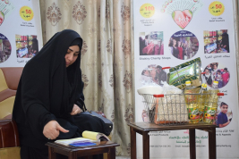 فرع النجف :- تسليم الكفالة الشهريه من قبل السيدتين / ولاء مجيد ووالدتها الى السيدة  (احلام . س . ر )