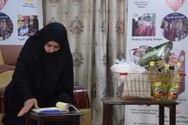 فرع النجف :-  تسليم الكفالة الشهريه لاسره السيده / هدى . س . م ) من قبل السيد / علي التميمي 