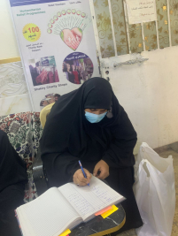 فرع البياع : تسليم مساعده ماليه للارمله ( ازهار . ج) من المتبرع الحاج عبد الصاحب الشاكري