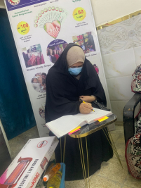 فرع البياع : تسليم المساعدة المالية المقدمة من الحاج  (عبد الصاحب الشاكري  ) للارملة (ايمان م)