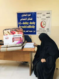 فرع مدينة الصدر : تسليم تبرع الاستاذ / عبدالصاحب الشاكري 