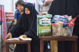 فرع النجف :- تسليم الاعانه لاسره المتعففه / شيماء . ك . س من قبل الحاج / عبد الصاحب الشاكري