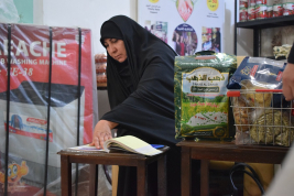 فرع النجف :-   تسليم الكفالة الشهريه للسيده / ( صفاء . ن . م ) من قبل السيد / جلال فيروز