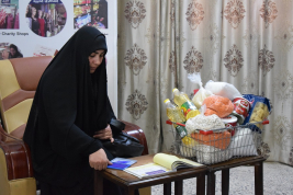 فرع النجف :- تسليم الكفاله الشهريه للسيدة / عدويه . ع . ا من قبل السيده / فيروز الواسطي
