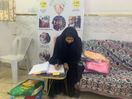 فرع البياع : مساعدة مالية من المتبرع /الحاج عبد الصاحب الشاكري , للارملة المسنة (بلقيس ,ن) 