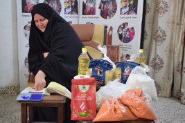 فرع النجف :- تسليم تبرع مالي من السيده / زينب محمد علي  لاسره الارمله / نجاح . س . ذ 