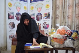 فرع النجف :- تسليم الاعانه لاسره الارمله / مروه . ك . ع المستلمه من قبل السيد / ليث كبة 