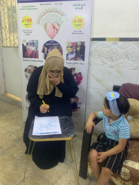 فرع البياع : تسليم الكفاله الشهريه من السيد (نبيل البزاز ) لاسرة الارمله ( ناهده م ) 