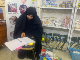 فرع البياع : تسليم المساعدة المالية المقدمة من ام معد للارملة ( لمياء ع ) 