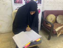 فرع البياع : تسليم مساعده مالية للارملة وجدان ,ع من السيد الحاج ( عبد الصاحب الشاكري) 