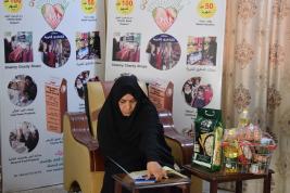 فرع النجف :-  تسليم الكفاله الشهريه لاسره الارمله / حنين . ع . م من قبل السيدة / عاليه جواد