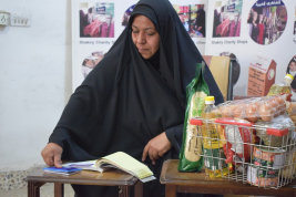 فرع النجف :-  تسليم الكفاله الشهريه  لاسره السيده / جنان . ع . خ 