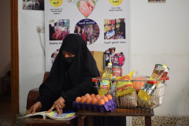 فرع النجف :-  تسليم المساعده لاسره السيده / مها . ك . س المستلمه من الحاج / عبد الصاحب الشاكري 