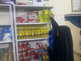 فرع البياع : مساعدة مالية للارملة (جنان , ع) من الحاج / زيد الواسطي