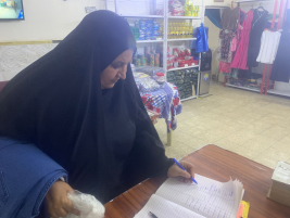 فرع البياع : مساعدة مالية من المتبرع / علي الشاكري للارملة (غصون , ع) 