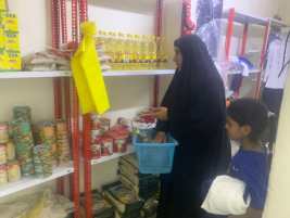 فرع البياع : مساعدة مالية للارملة ( اسيل , ح ) من المتبرع  / نبيل البزاز 