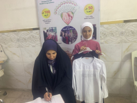فرع البياع : تسليم كفاله الايتام للارملة (حميده , ك ) من المتبرع الكريم / باسل عبد الجبار