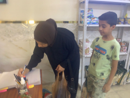 فرع البياع: تسليم الكفالة الشهرية المقدمة من (الدكتور/ حيدر مجيد) 