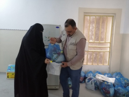 فرع النجف :-  تسليم التبرع الوارد من (الآنسة/ ندى سلام موسى)