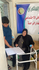 فرع البياع : تسليم الأعانة الشهرية لأسرة المتعففة ( لميعه . غ . غ  ) .