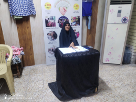 فرع البصرة : تسليم الأعانة الشهرية لأسرة الأرملة المتعففة ( كريمه . ر . ع ) .