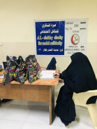 فرع مدينة الصدر : تسليم التبرع المقدم الى الاسرة الارملة ( فاطمة ، ج )
