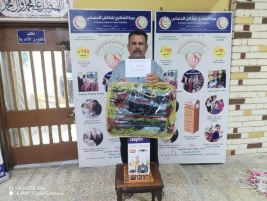 تسليم المساعدات الخيرية الشهرية الواردة من المتبرع الكريم ( هـ . ك )  
